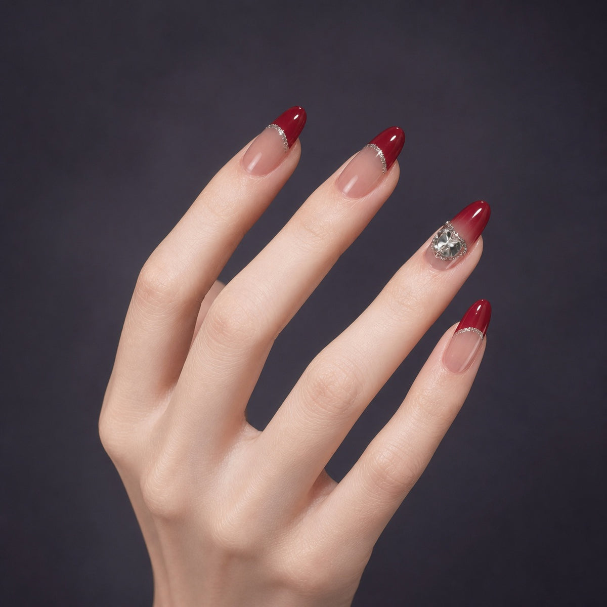 Ruby Crystal French press-on nails on hand