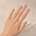 Moonlit Polka press-on nails on hand