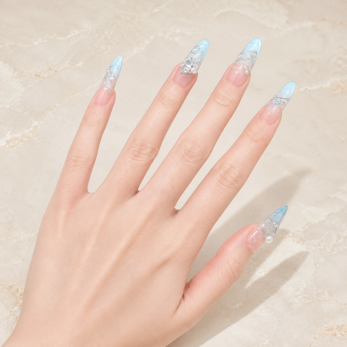 Icy Azure press-on nails on hand