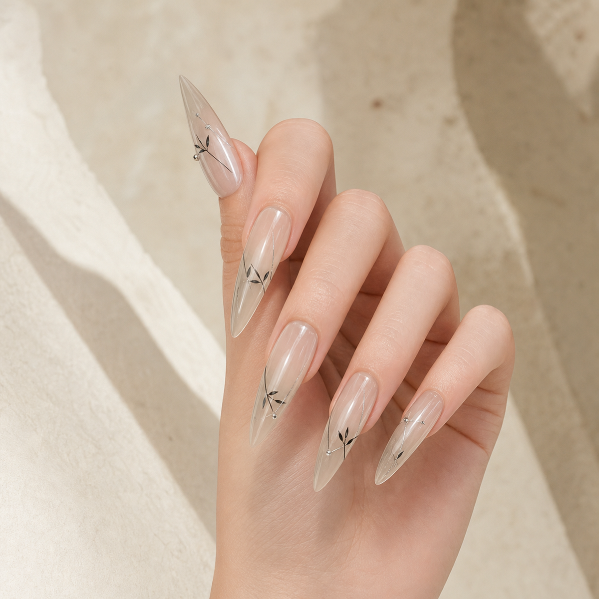 Bamboo Whisper press-on nails on hand