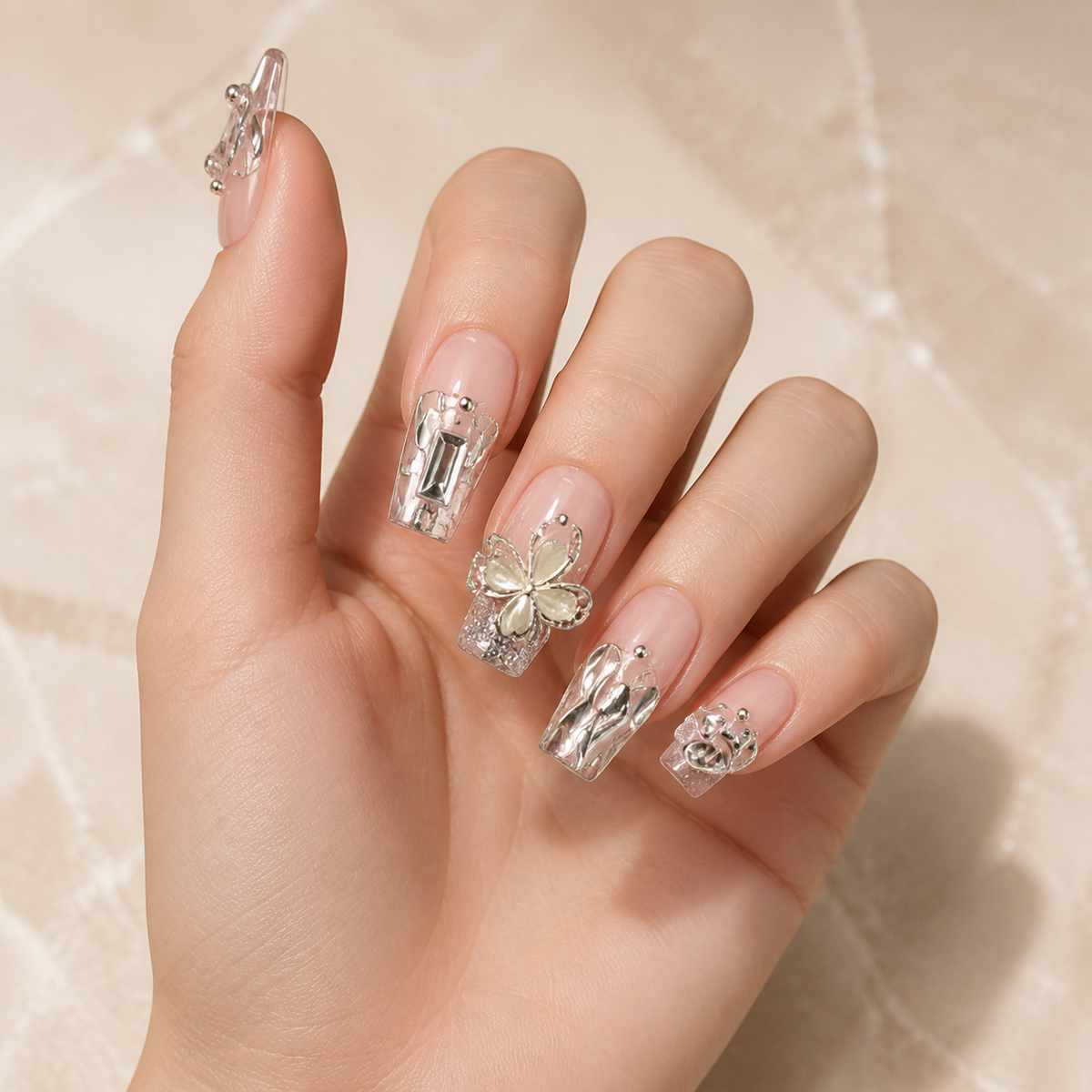 Silver Butterfly press-on nails on hand