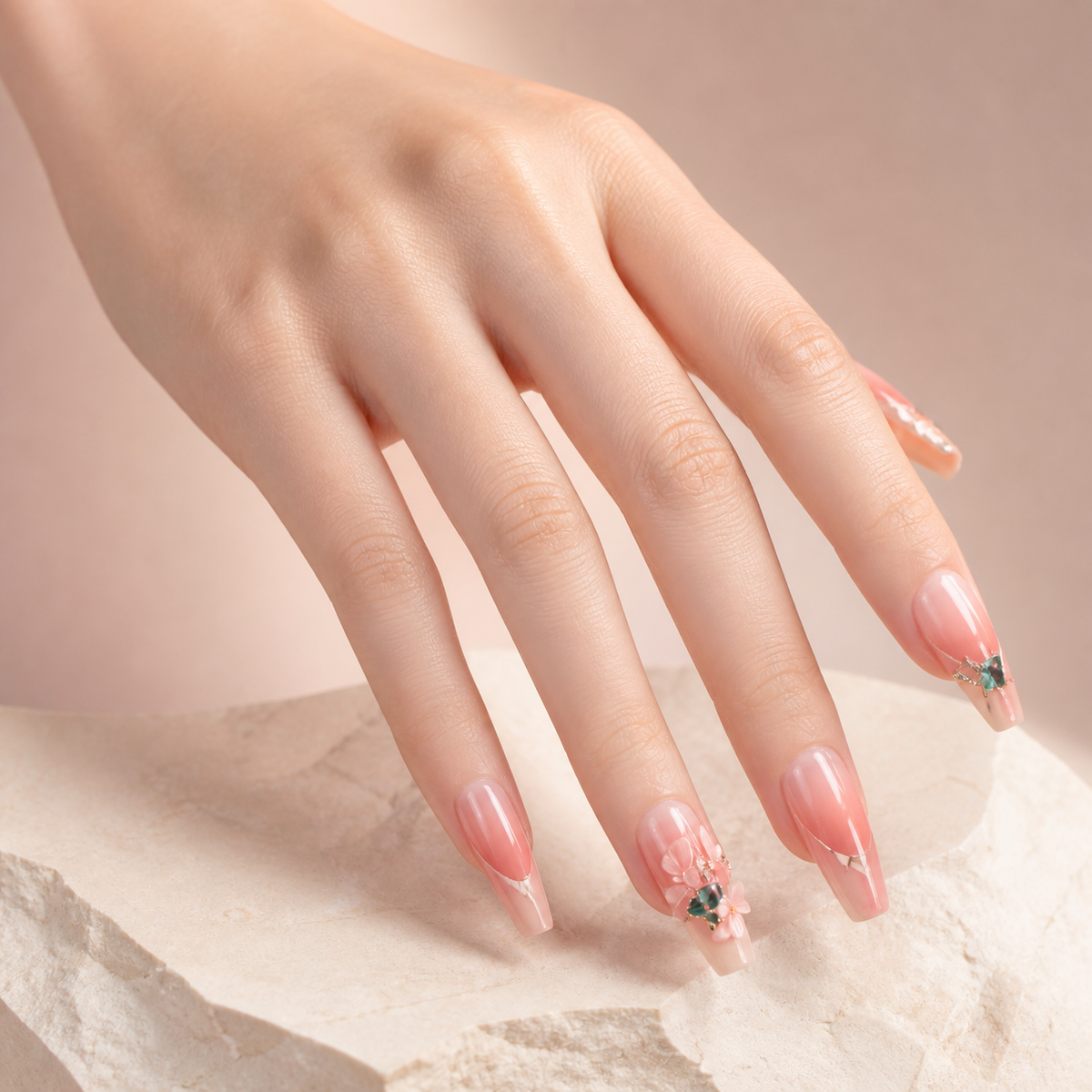 Emerald Blush press-on nails on hand