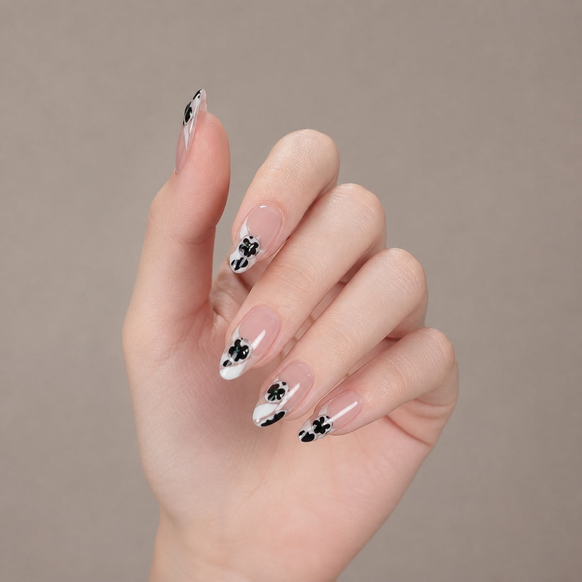 Midnight Bloom press-on nails on hand