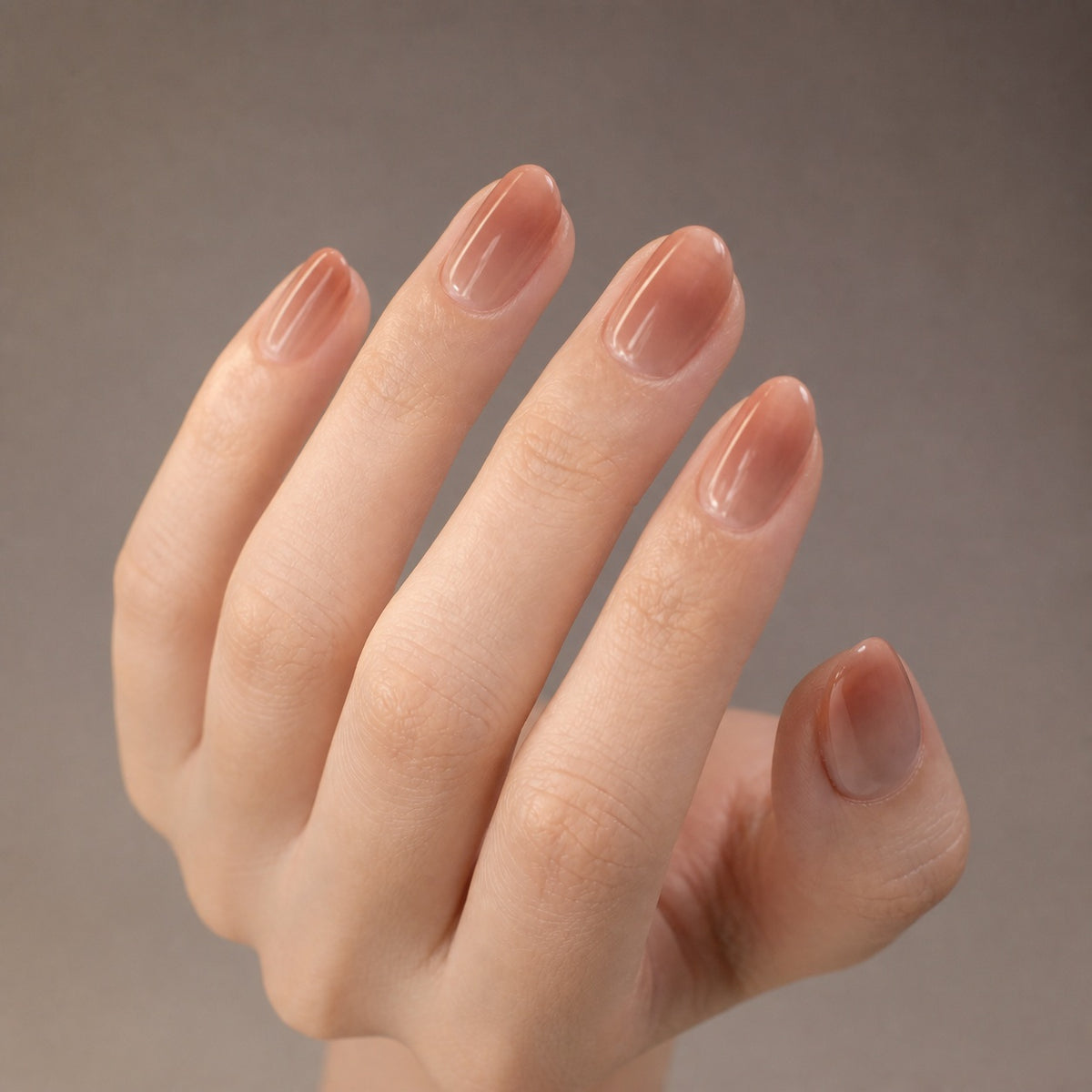Tea Glaze press-on nails on hand